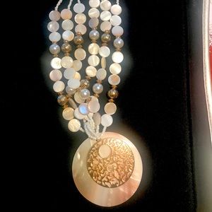 Sea shell necklace with gold beads